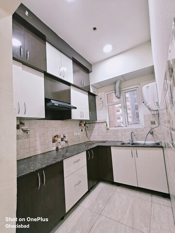 Kitchen in 2 BHK Apartment at Gaur City 2 - 14th Avenue, Sector 16c Greater Noida – for Rent