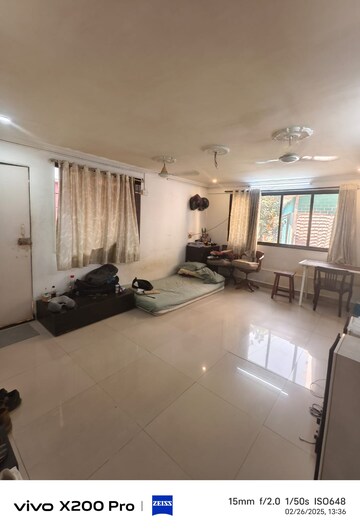 Living Room in 1 BHK Apartment at St Peters CHS, Bandra West – for Rent