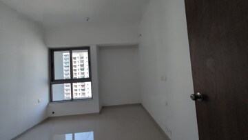 Master Bedroom in 2 BHK Apartment at Kalpataru Immensa, Kolshet Road – for Rent