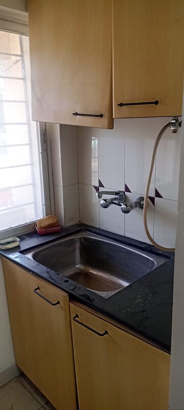 Kitchen in 2 BHK Apartment at Marigold Society, Karve Nagar – for Rent