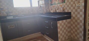 Kitchen in 1.5 BHK Apartment at Auric City Homes, Sector 82 – for Rent
