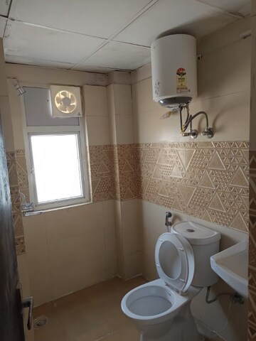 Bathroom in 3 BHK Apartment at Amrapali Golf Homes, Sector 4, Greater Noida – for Rent