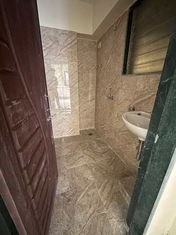 Bathroom in 1 BHK Apartment at Lodha Palava Crown, Dombivli East – for Sale