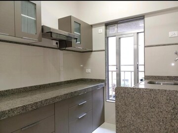 Kitchen in 2 BHK Apartment at Riddhi Garden, Malad East – for Rent