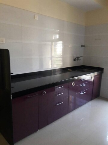 Kitchen in 2 BHK Apartment at Manshi Adinarayan Residency, Goregaon West – for Sale