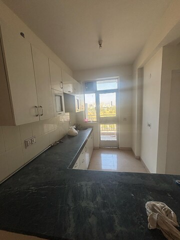 Kitchen in 2 BHK Apartment at Conscient Habitat, Sector 99a – for Rent