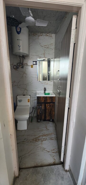 Bathroom in 4 BHK Apartment at Amarpali Exotica, Sector 50 – for Sale