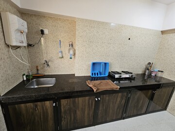 Kitchen in 2 BHK Apartment at Millionaire Heritage, Andheri West – for Rent