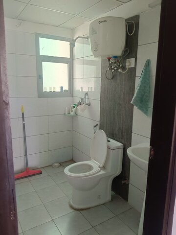 Bathroom in 2 BHK Apartment at Gulshan Bellina, Sector 16 Greater Noida – for Rent
