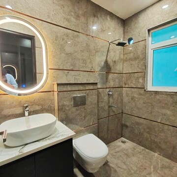Bathroom in 4 BHK Builder Floor at Ansal API Esencia, Sector 67 – for Sale