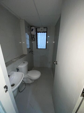 Bathroom in 1 BHK Apartment at Runwal Gardens Phase 2, Dombivli East – for Rent