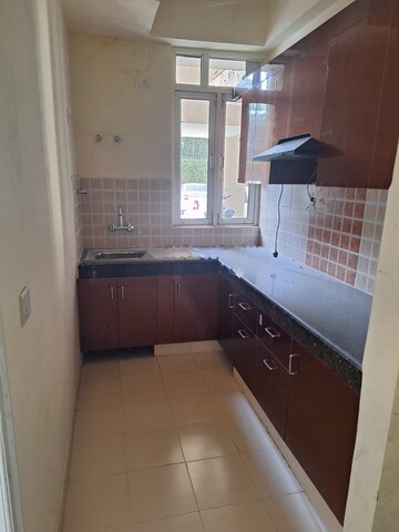 Kitchen in 2.5 BHK Apartment at ROF Aalayas, Sector 102 – for Rent