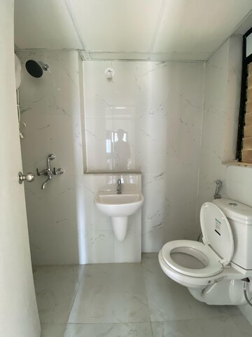 Bathroom in 1.5 BHK Apartment at Runwal Gardens Phase 2, Dombivli East – for Rent