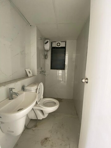 Bathroom in 2 BHK Apartment at Runwal Gardens Phase 2, Dombivli East – for Rent