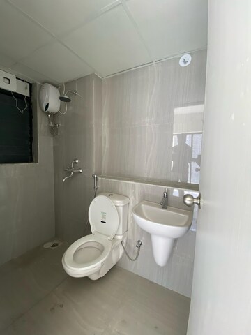 Bathroom in 2 BHK Apartment at Runwal Gardens Phase 2, Dombivli East – for Rent