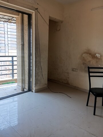 Room in 2 BHK Apartment at Prism Heights, Taloja – for Rent