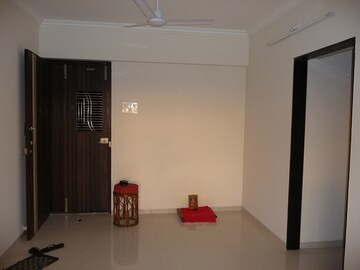 Room in 2 BHK Apartment at Karwa Om Hemgiri, Borivali East – for Rent