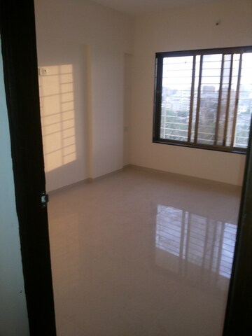 Room in 2 BHK Apartment at Karwa Om Hemgiri, Borivali East – for Rent