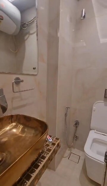 Bathroom in 2 BHK Apartment at Atlas Skywalker CHS, Andheri West – for Rent
