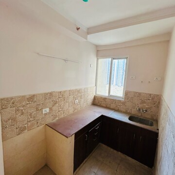 Living Room in 2 BHK Apartment at Amrapali Golf Homes, Haibatpur – for Rent