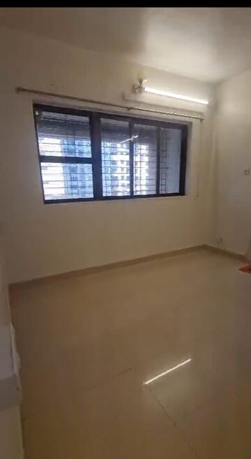 Room in 2 BHK Apartment at Royal Classic Co Op Society, Andheri West – for Rent