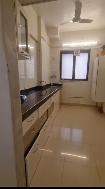 Kitchen in 2 BHK Apartment at Royal Classic Co Op Society, Andheri West – for Rent