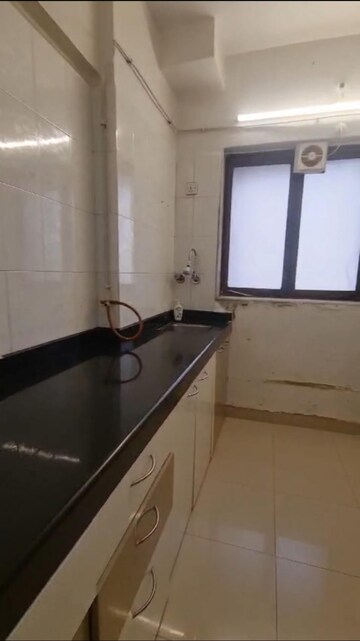 Kitchen in 2 BHK Apartment at Royal Classic Co Op Society, Andheri West – for Rent