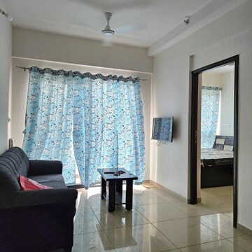Living Room in 1 BHK Apartment at Duville Riverdale Suites, Kharadi – for Rent