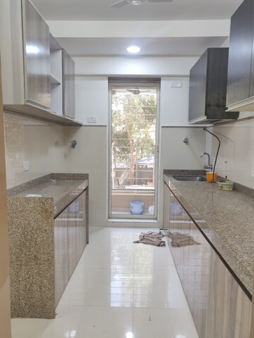Kitchen in 4 BHK Apartment at Suchidham Complex, Goregaon East – for Rent