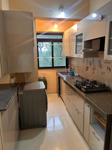 Kitchen in 2 BHK Apartment at Kanakia Rainforest, Andheri East – for Rent