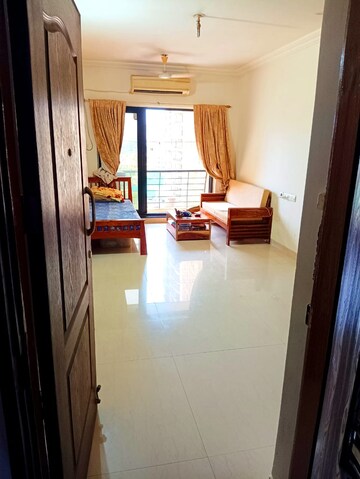 Living Room in 2 BHK Apartment at K Raheja Heights, Malad East – for Rent