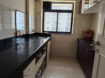 Kitchen in 2 BHK Apartment at Lokhandwala Infrastructure Spring Leaf, Kandivali East – for Rent