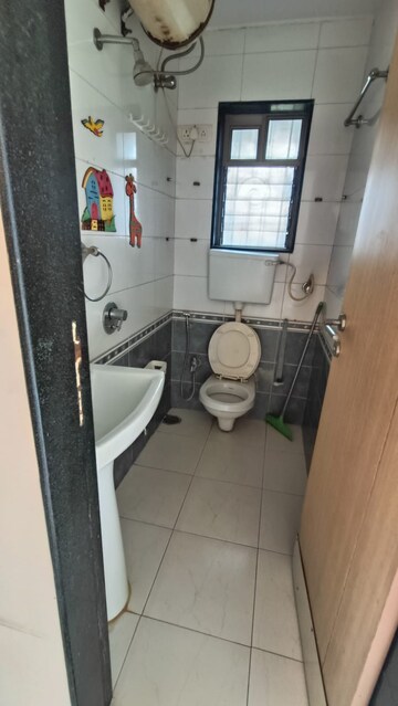 Bathroom in 2 BHK Apartment at Prism Enclave, Kandivali East – for Rent
