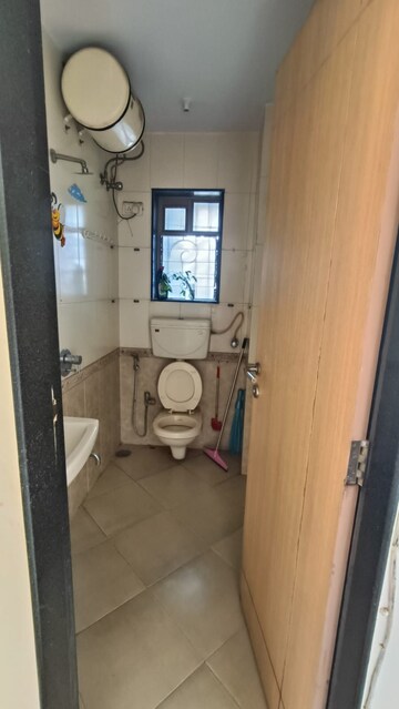 Bathroom in 2 BHK Apartment at Prism Enclave, Kandivali East – for Rent