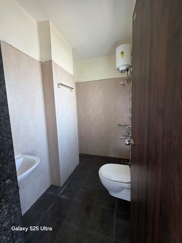 Bathroom in 2 BHK Apartment at Zinnia Elegance, Wakad – for Rent
