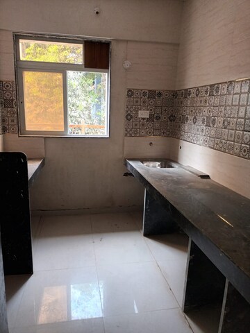 Kitchen in 1 BHK Apartment at Patel Ram Ambar, Ambernath East – for Sale