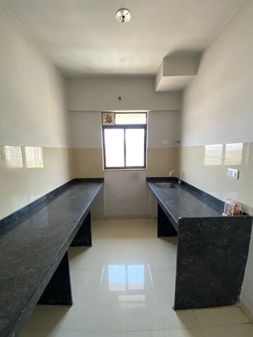 Kitchen in 1 BHK Apartment at Lodha Palava Downtown, Dombivli East – for Rent