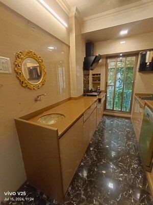 Kitchen in 3 BHK Apartment at Karan CHS Versova, Versova – for Sale