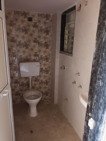 Bathroom in 1 BHK Apartment at Patel Prestige, Ambernath West – for Sale