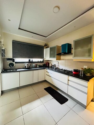 Kitchen in 3 BHK Apartment at Marvel Zephyr, Kharadi – for Rent