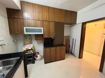 Kitchen in 3 BHK Apartment at Romell Umiya Grandeur, Goregaon East – for Rent