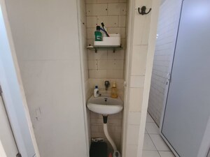 Bathroom in 1 RK Apartment at United Tenant CHS, Andheri East – for Sale