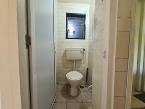 Bathroom in 1 RK Apartment at United Tenant CHS, Andheri East – for Sale