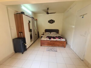 Living Room in 1 RK Apartment at United Tenant CHS, Andheri East – for Sale