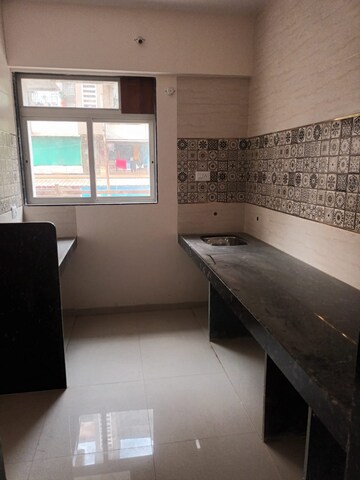 Kitchen in 2 BHK Apartment at Patel Ram Ambar, Ambernath East – for Sale