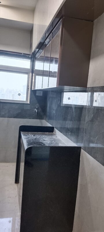 Kitchen in 2 BHK Apartment at DGS Sheetal Anupam, Malad West – for Rent