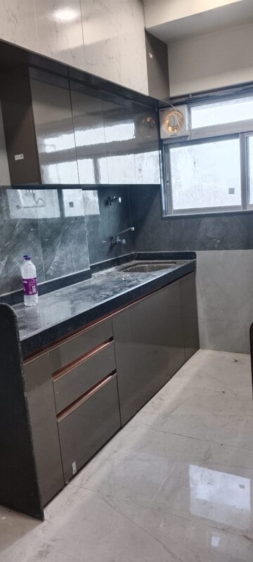 Kitchen in 2 BHK Apartment at DGS Sheetal Anupam, Malad West – for Rent