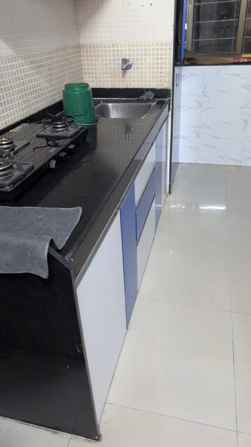 Kitchen in 2 BHK Apartment at Sudarshan Sky Garden, Ghodbunder Road – for Rent