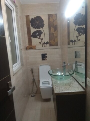 Bathroom in 4 BHK Builder Floor at New Friends Colony – for Rent