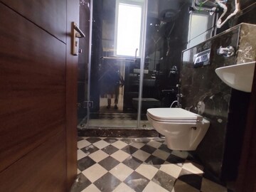 Bathroom in 3 BHK Apartment at Chittaranjan Park – for Rent